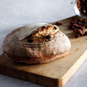 Sourdough cinnamon bread on a plank.