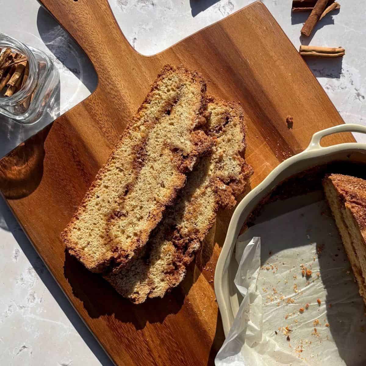Sourdough discard cinnamon quick bread on a cutting board.