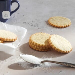 Sugar cookies and a spoon full of sugar.