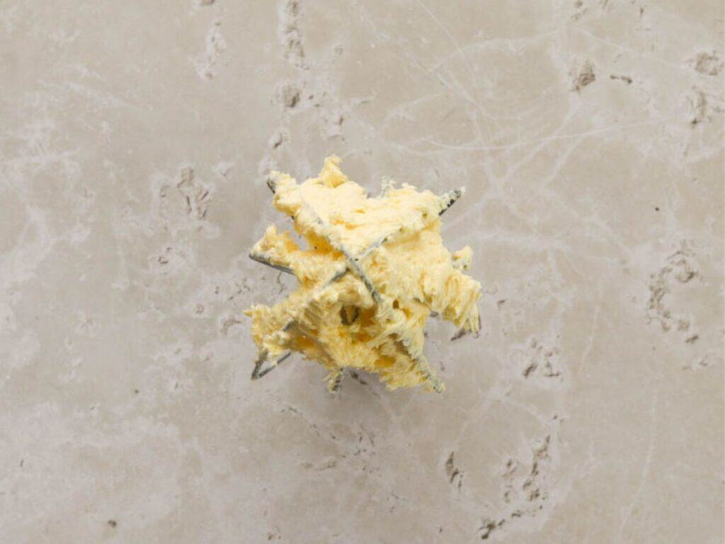 Creaming the butter for discard shortbread.