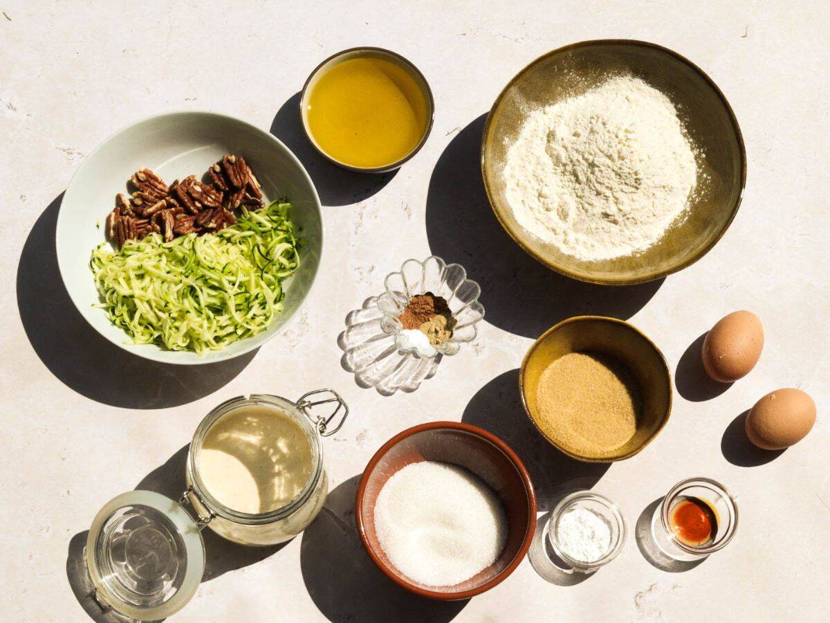 All the ingredients you need to make sourdough zucchini muffins.
