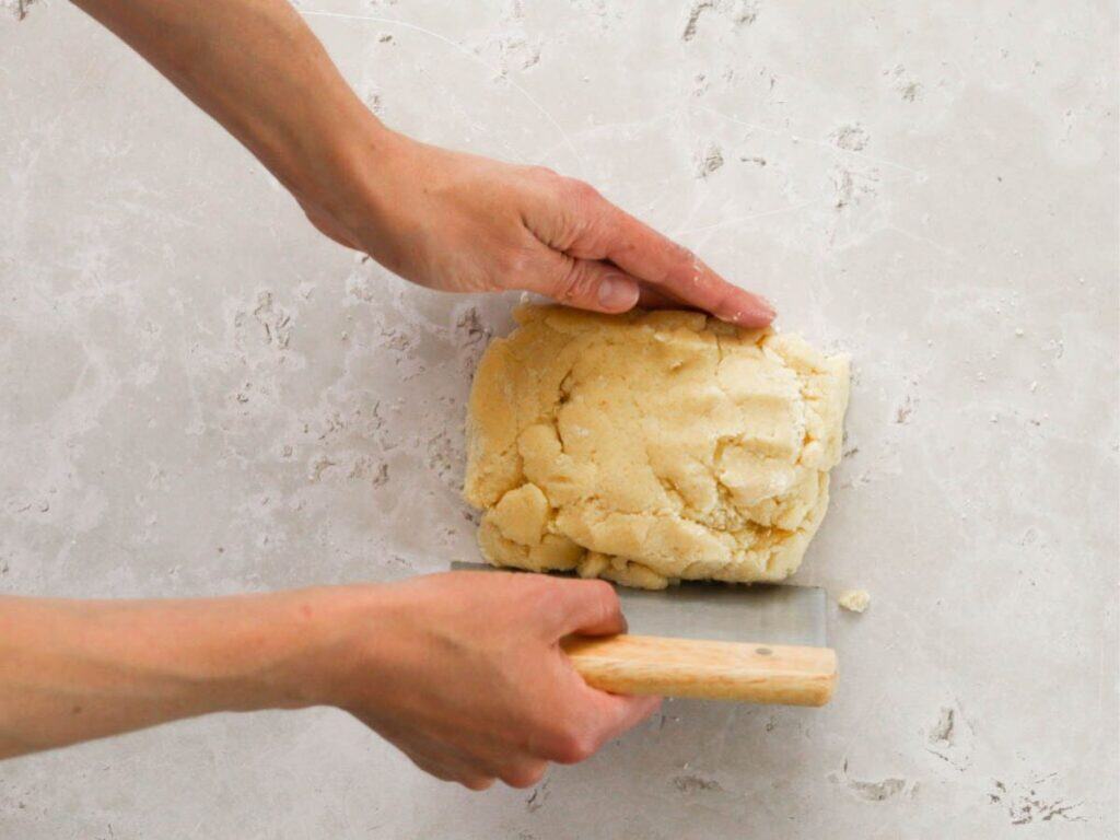 Shaping the dough for shortbread with sourdough discard.