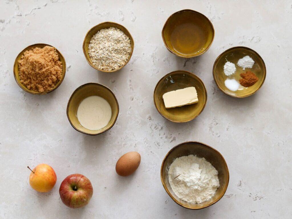 All the ingredients needed to make apple sourdough muffins.