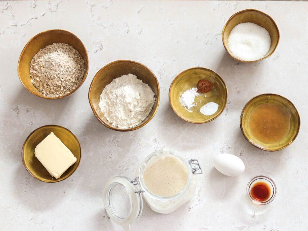 All the ingredients you need to make sourdough oatmeal cookies.
