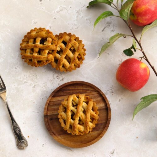 Three mini apple pies.