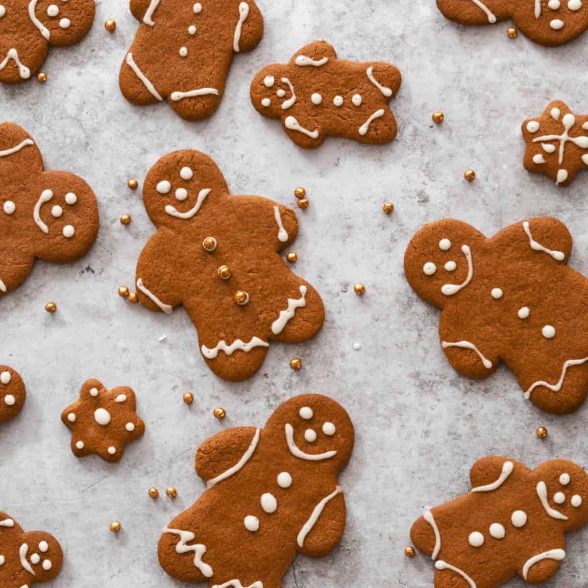 Gingerbread men on a grey background.