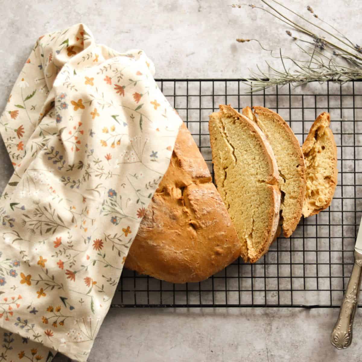 Sourdough soda bread on a cooling rack.