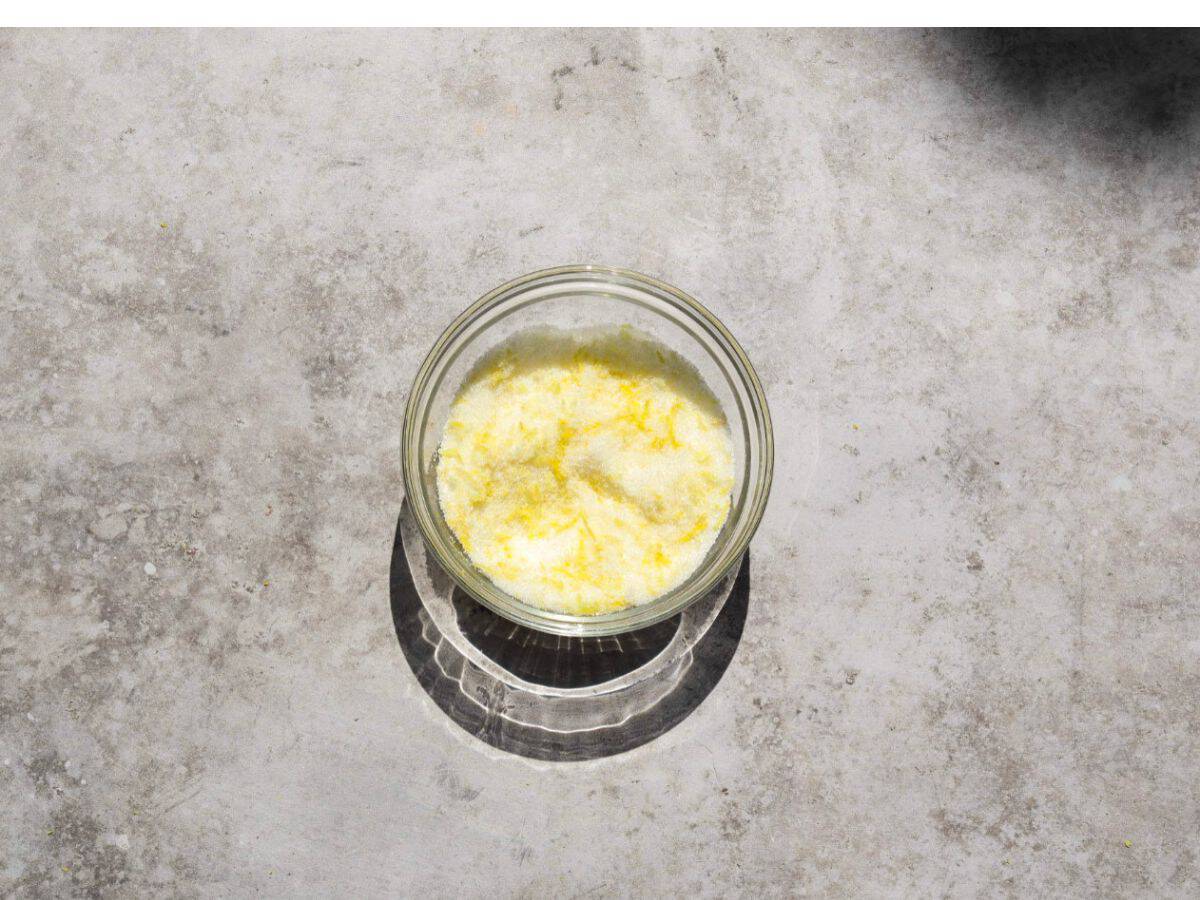 Homemade lemon sugar in a bowl.