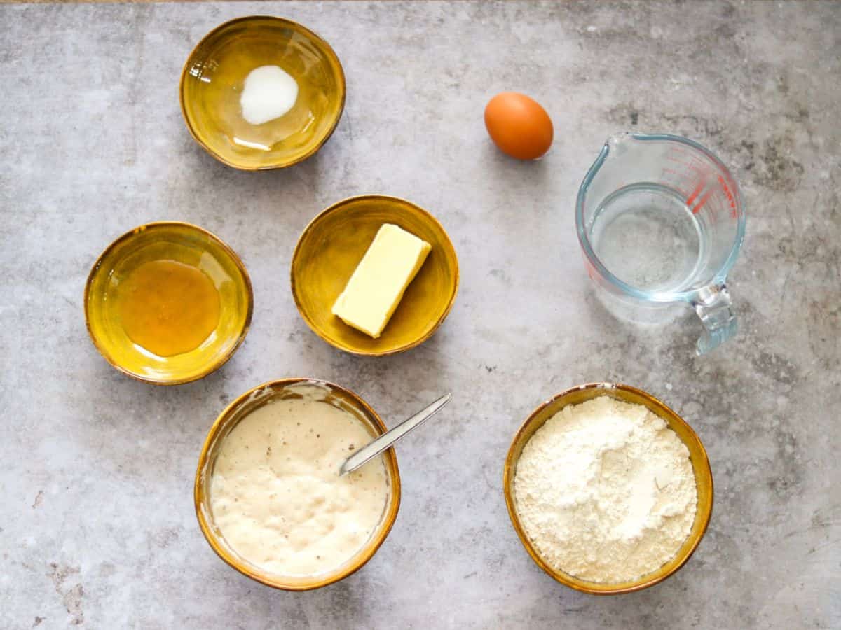 All the ingredients you need to make sourdough hot dog buns.